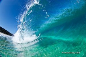 a water view of a tubing wave at Ehukai